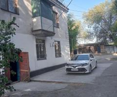 Квартиру 2-х комнатная, капитальный гараж, земельный участок 12,5 соток.